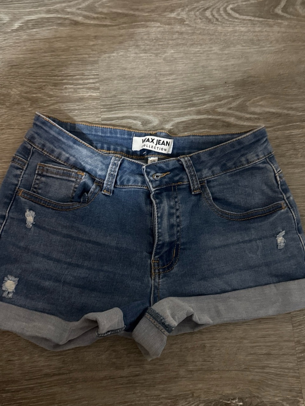 Women's Distressed Blue Denim Roll-Cuff Shorts